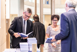 Dr. Thierry Schnyder signs the book "Der Notar im Wallis - Besonderer Teil"